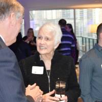 T.Haas enjoys conversation with two alumnae